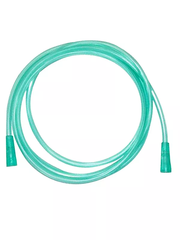 Przezroczysta, zielona rurka tlenowa medyczna ułożona w okrąg na białym tle.